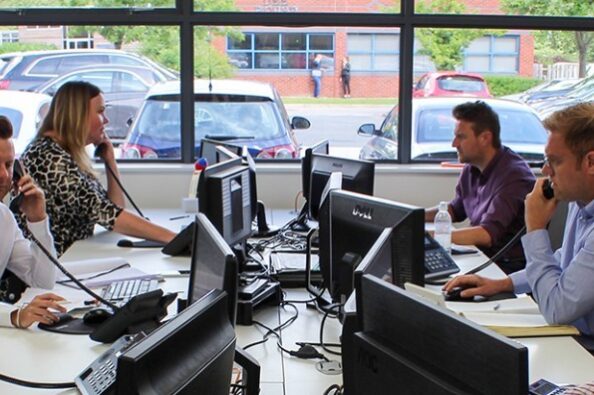 broadgate voice & data The Freedom and Scalability of a Hosted VoIP Telephone System office users on phone